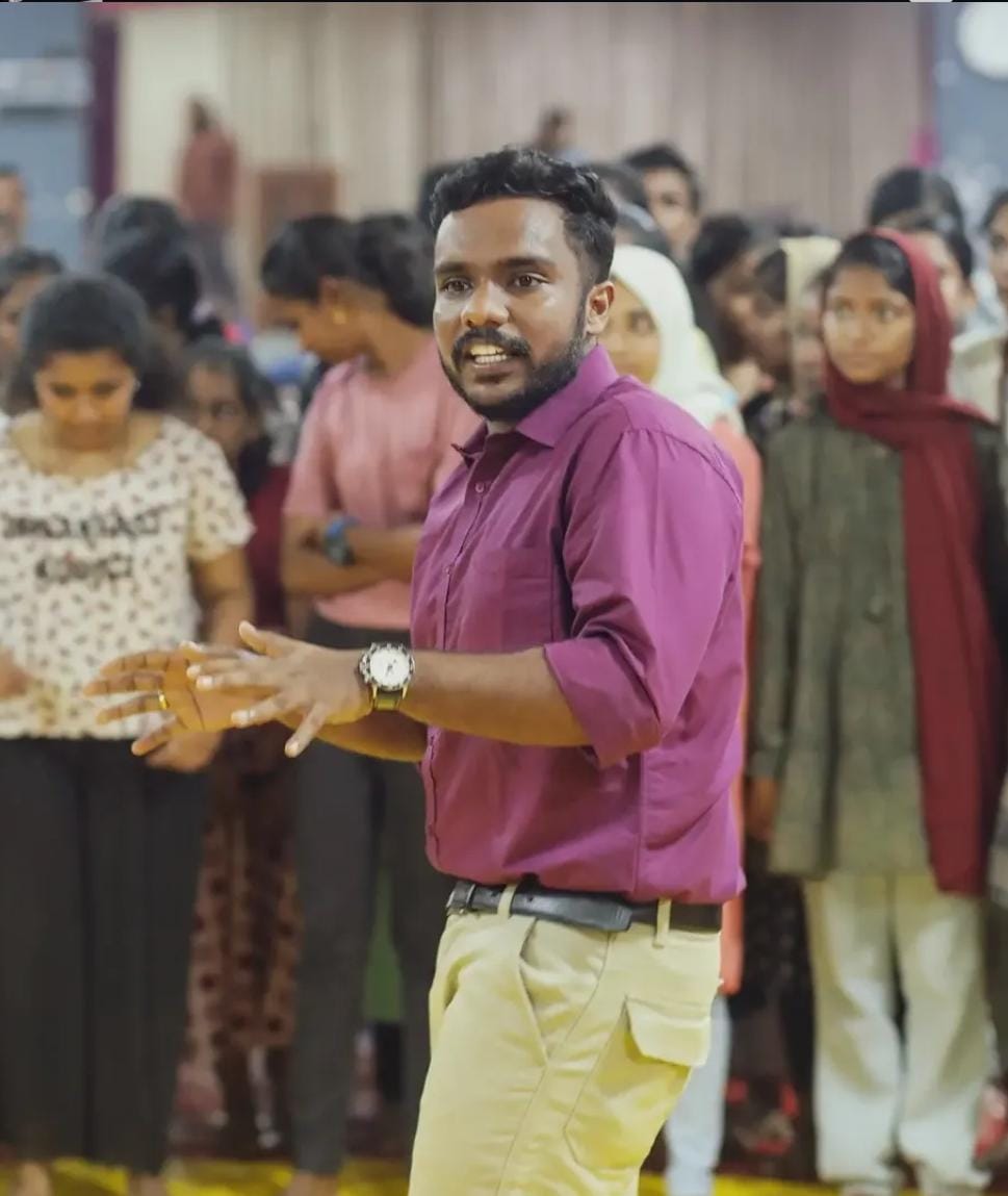 Teacher speaking to students
